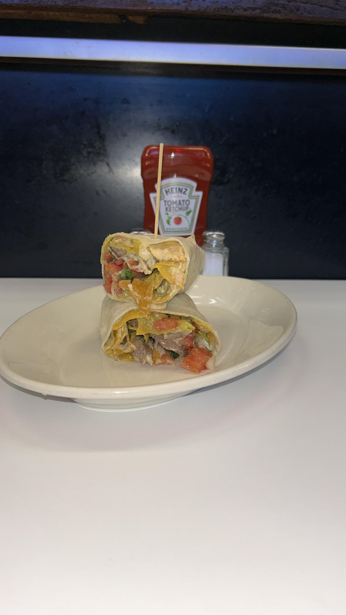 Players Retreat Green Chilaquiles Burger-Burrito March 2025